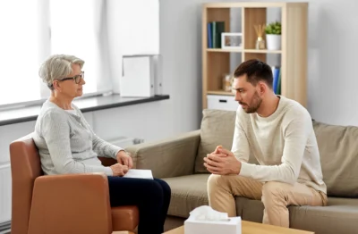 Man receiving counseling at a meth addiction treatment center