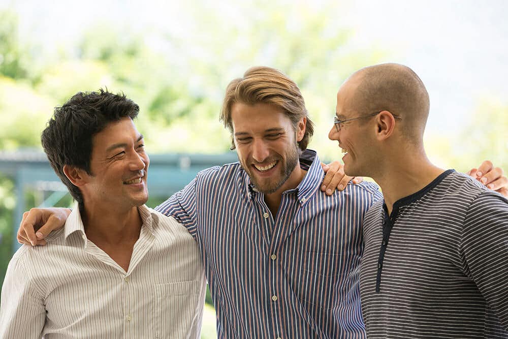 Three men meeting to support a friend with depression