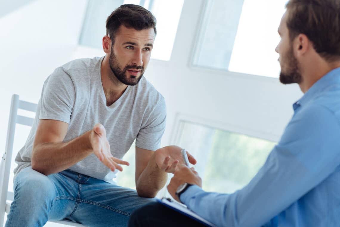 Confused man learning about combined drug intoxication