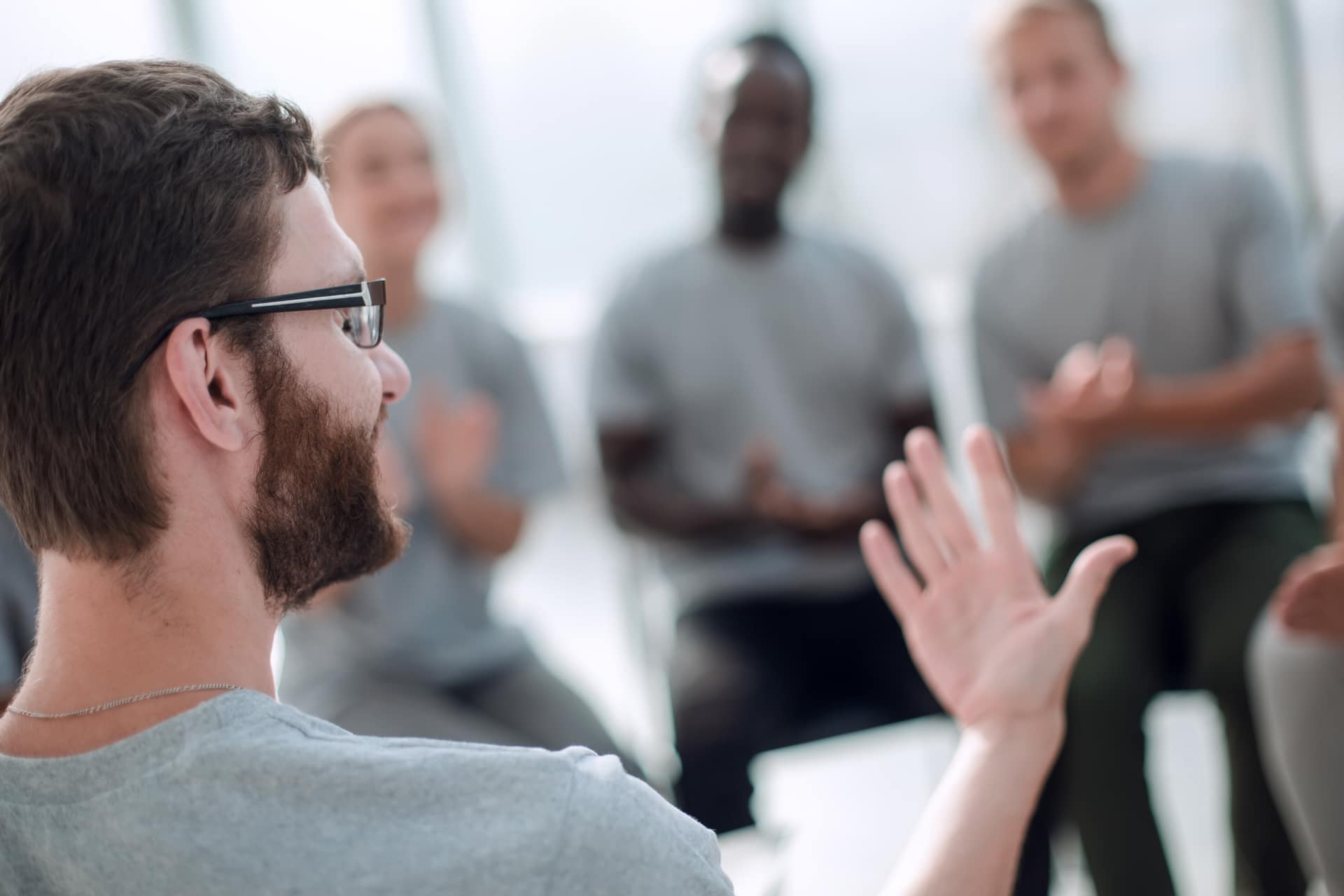 Man explaining facts and myths about meth to addiction treatment group