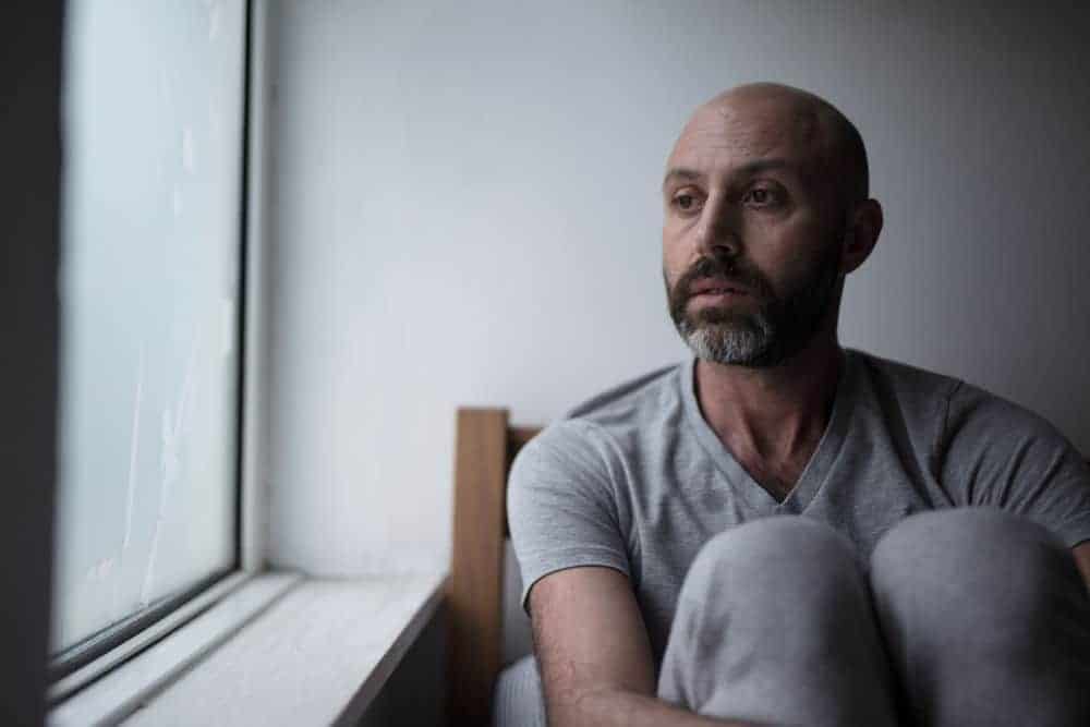 Sad man feeling isolated